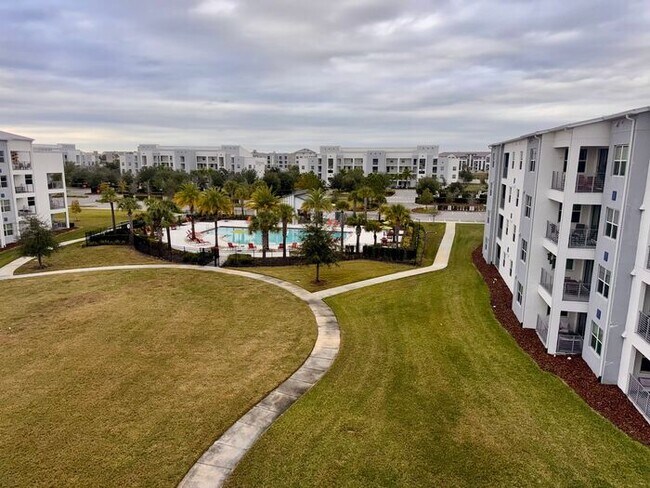 Building Photo - Fully Furnished 2/2 Luxury Storey Lake Condo near Disney with a Stunning Balcony Viiew!