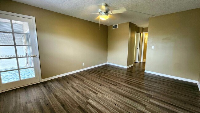 Building Photo - 2700 Coral Springs Dr