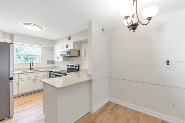 Building Photo - 3835 Almeria Ave