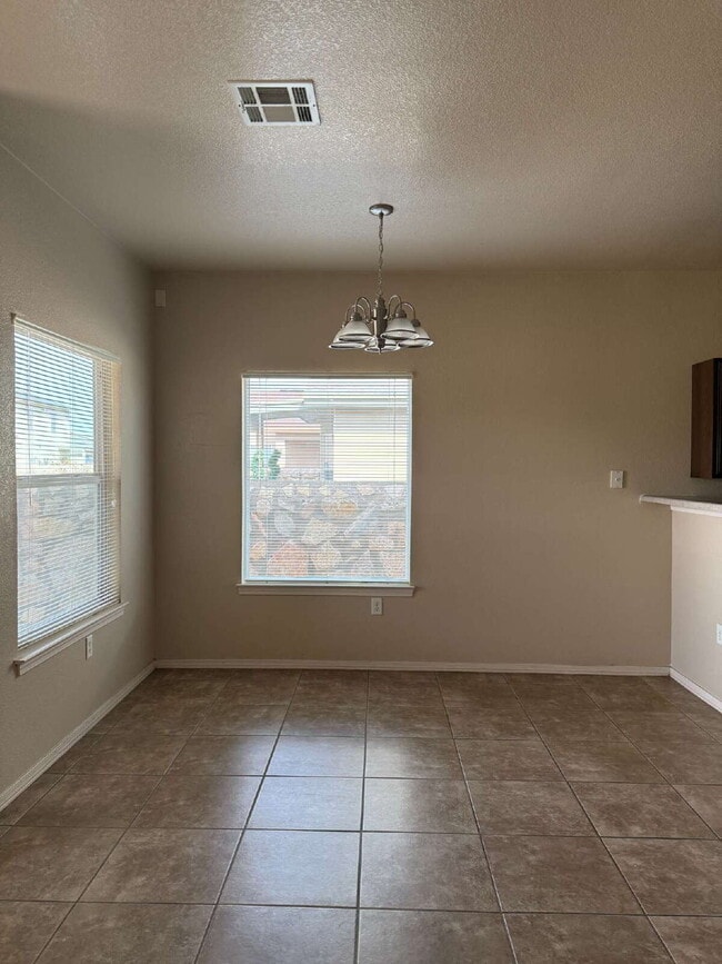 Building Photo - Cozy three-bedroom two bath at a great location! 10429 Silvercloud Drive, El Paso, Texas 79924
