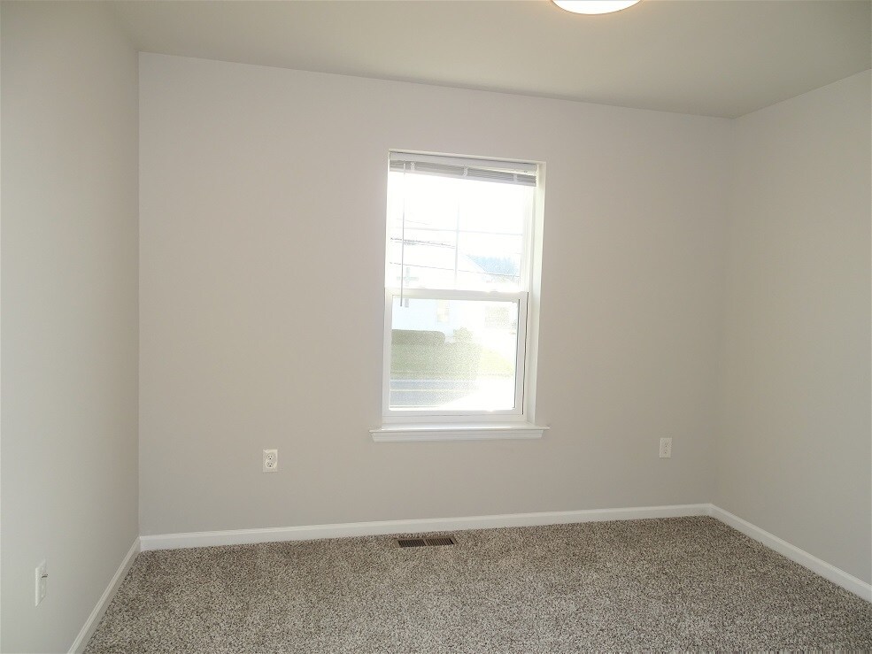 Building Photo - 21 Cobblestone Ct