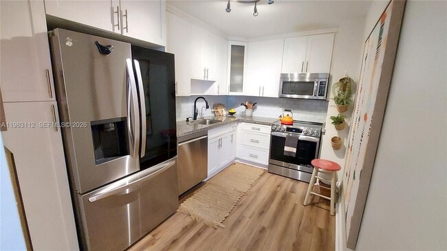 Building Photo - 3375 N Country Club Dr