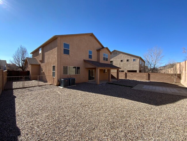 Building Photo - 4 Bedroom Home Available Near Unser Blvd N...