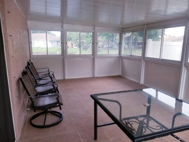 Spacious patio with view of the water - 10081 Boynton Place Cir