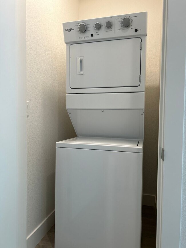 Building Photo - Coming soon! Lower unit  2 bed 1 bath townhome with attached garage