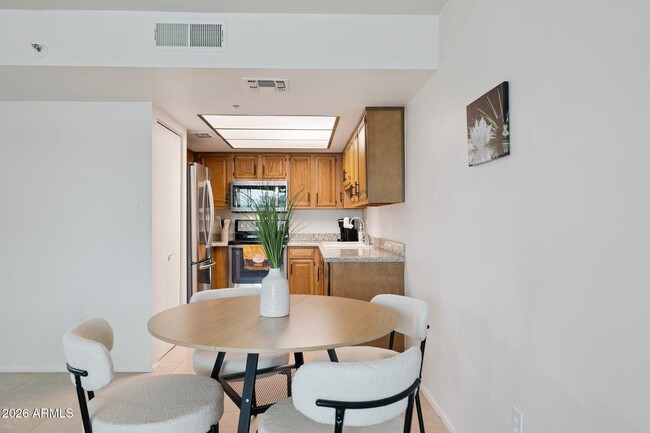 Building Photo - 7950 E Camelback Rd