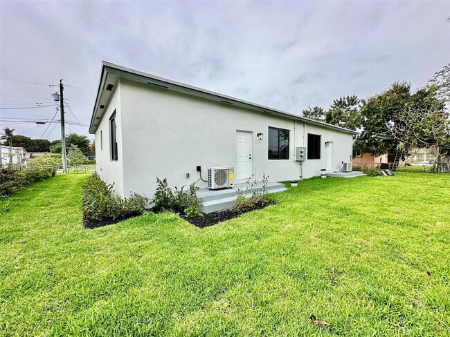 Building Photo - 2399 NW 105th St