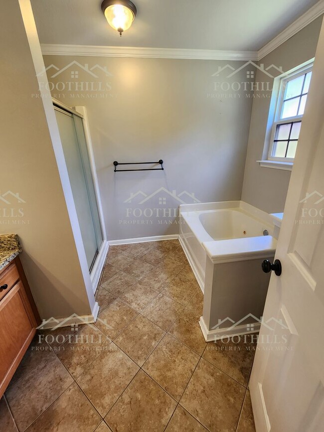 Building Photo - Beautiful 3-Bedroom Brick Home with Sunroo...