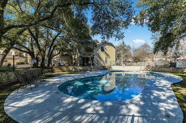 Building Photo - Sparkling Pool Views + Prime Location = A Must See Opportunity!