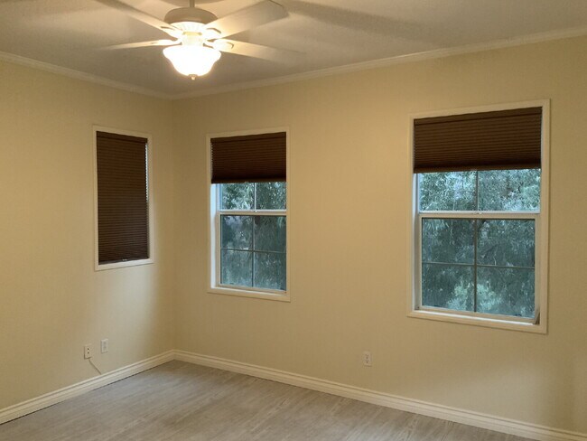 Building Photo - Beautiful Valencia Townhome in the Highly Desirable Village Walk Community