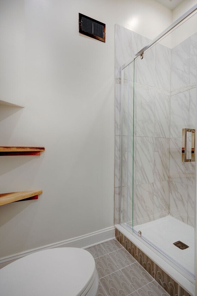 Building Photo - Newly Renovated 6 Bedrooms / 4 Bathrooms at Norris St