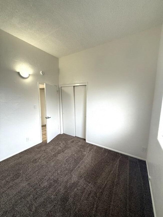 Building Photo - Completely renovated 3 bedroom apartment with a patio