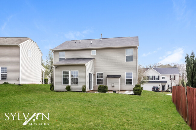 Building Photo - The charming 3-bedroom, 2.5-bathroom home