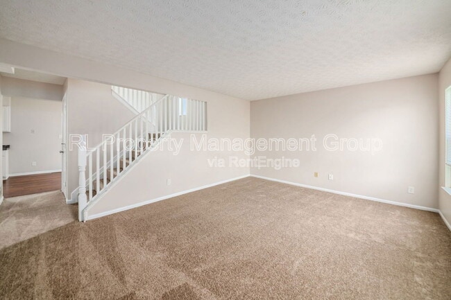 Building Photo - 7179 Feather Ct