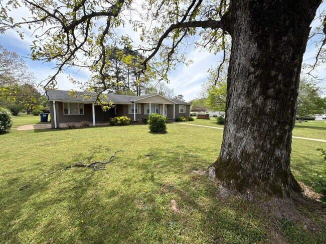 Building Photo - Section 8 Welcome!!! "Charming 4-Bedroom Home with Hardwood Floors on Ready Section Road!"