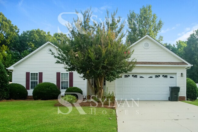 Building Photo - This home exudes a cheerful and welcoming ...