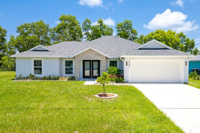 Building Photo - 5797 NW Coosa Dr