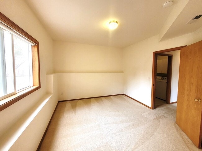 Building Photo - Charming Split-level 4 Bedroom Home - E Mc...
