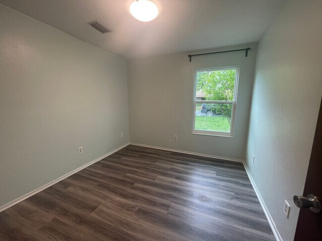 Building Photo - 3/2 (Northwood Oaks) Beautiful split floor plan home with custom brick accents and large landscap...