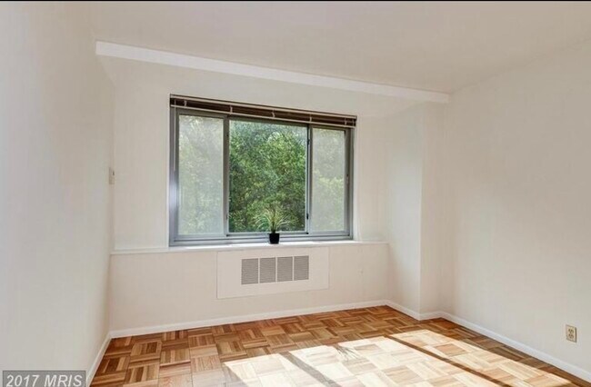 2nd bedroom has great size, beautiful view to Rockcreek Park and a closet - 4200 Cathedral Ave NW