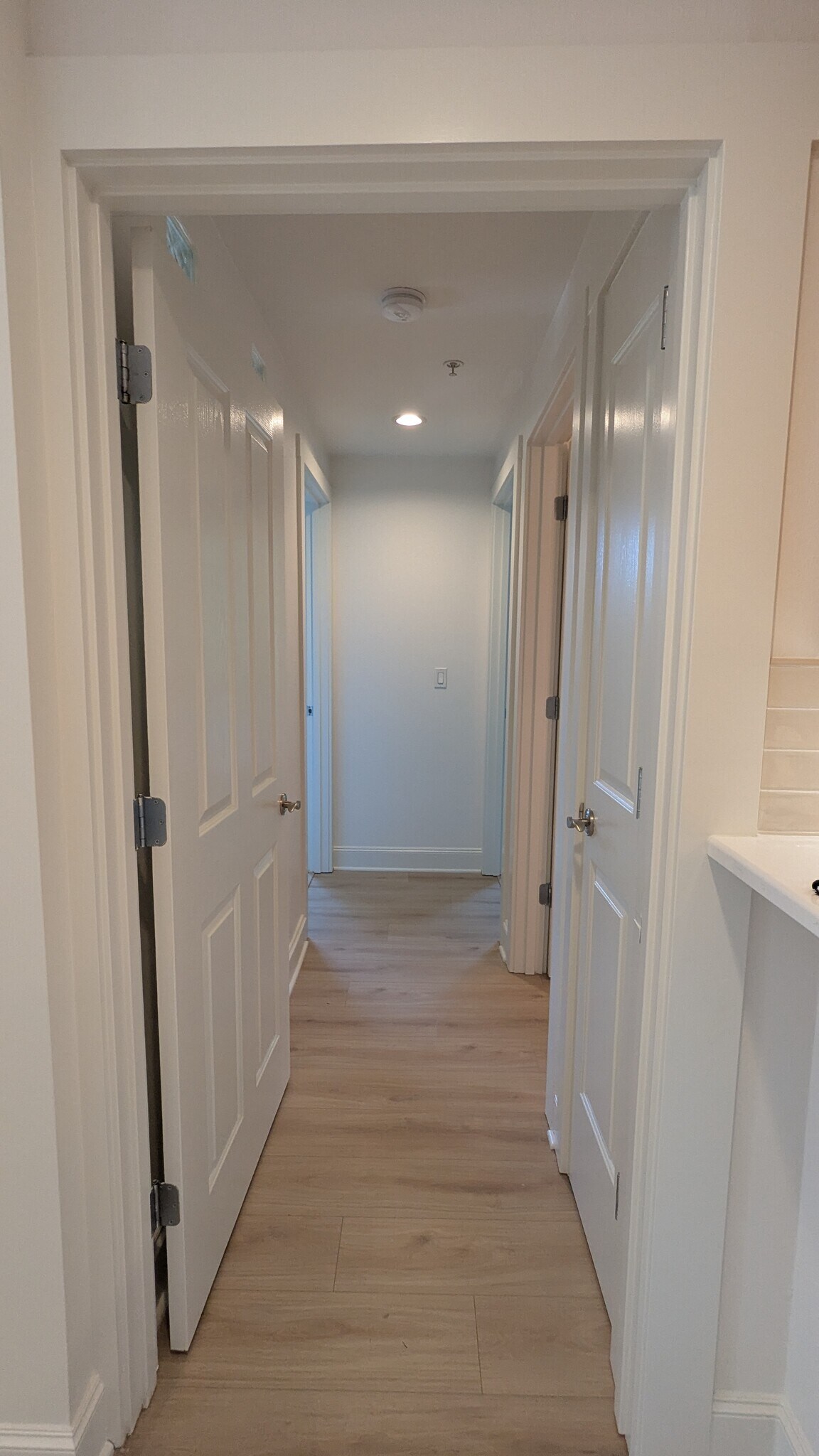 Hallway to other bedrooms - 196 SE Spokane St