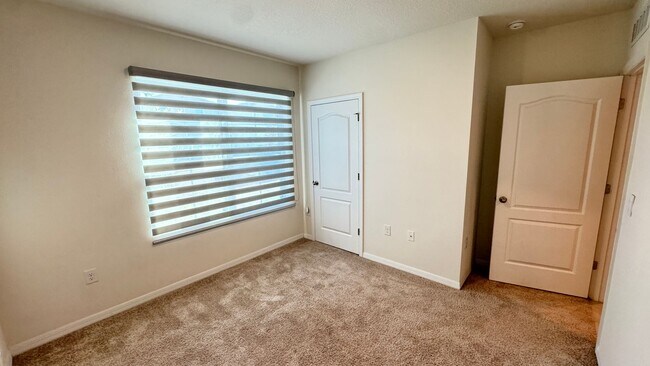 Building Photo - Available NOW! Spacious 4BD/2BA Haven in Villages at Harmony – Your Dream Home Awaits! WASHER & D...