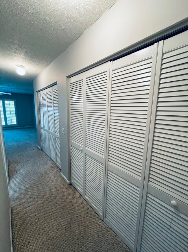 Main Bedroom Hall with Double Closets - 2050 Cherokee Dr