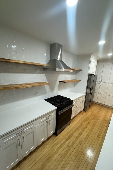 Gas Range and Hardwood Floating Shelves - 2337 W Roscoe St