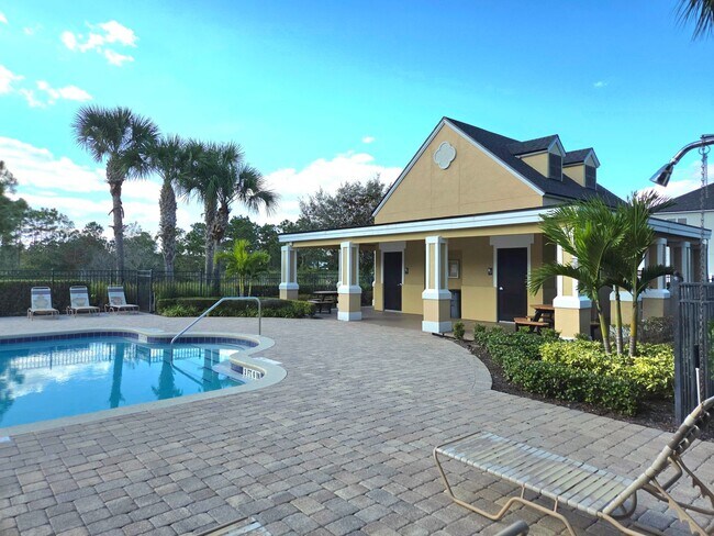 Building Photo - Avalon Park corner end Townhome featuring 3 bedrooms, 2.5 baths, plus office, and 2 car garage.