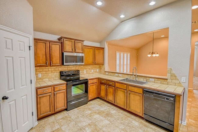 Building Photo - Beautiful three bedroom home with in-ground storm shelter!