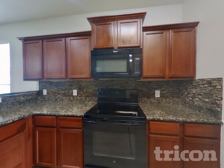 Building Photo - 6923 Musclewood Rd