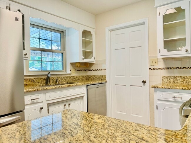 Building Photo - Charming Updated Home, Quiet Street Near Base, Fenced Yard!
