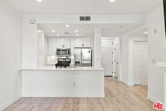 Building Photo - 12963 W Runway Rd