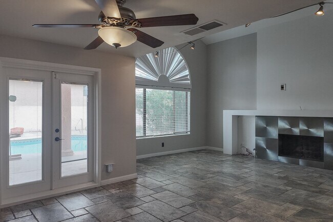 Building Photo - Modern Comfort with Pool & Spa in The Lakes – Solar Equipped Home