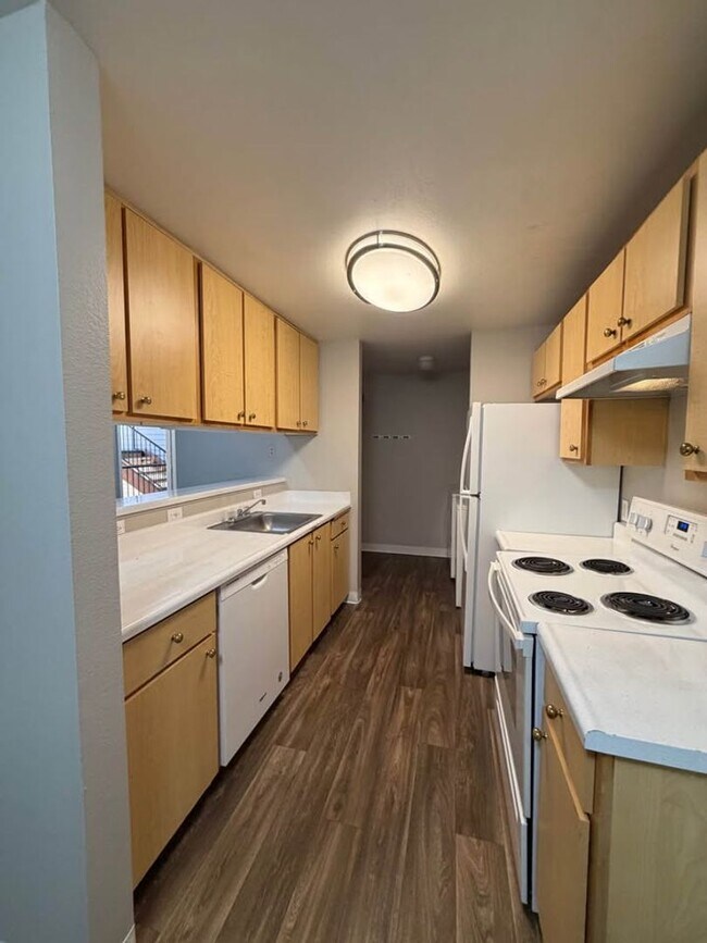Building Photo - Pet-Friendly Living with a Dog Park & Playground