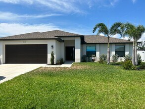 Building Photo - Move-In Ready 3BR Home in SW Cape Coral with Fenced Yar+Screened Lanai+Lawn Care Included+Pet Fri...