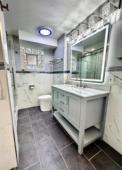 Fully redone large bathroom with all the amenities! Mirror has light choices, with anti fog. - 16W671 56th St