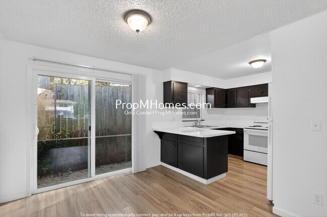 Building Photo - Three Bedroom Home in NE!