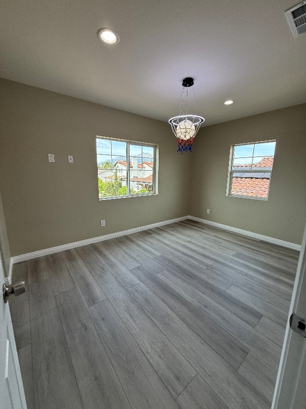 Building Photo - 7398 N Maple Ave