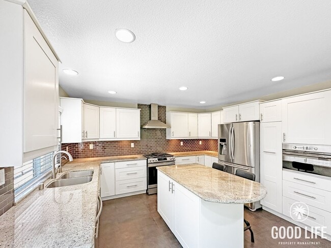 Building Photo - Beautiful 3-Bed Home w/ Vaulted Ceilings, Stainless Appliances, Private Backyard & 2-Car Garage