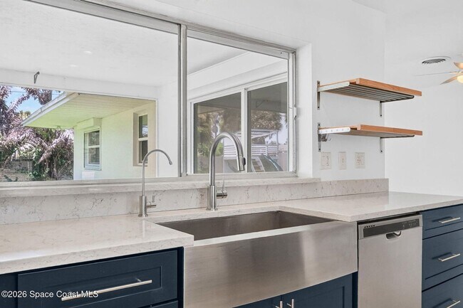 Building Photo - Welcome to this beautifully remodeled 4-bedroom, 3-bath home in the heart of Indialantic Beach!
