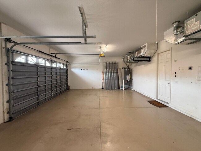 Building Photo - Luxurious 4 Bedroom 3 Bath Lakefront Pool Home W/3-Car Garage