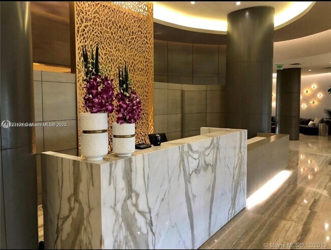 Building Photo - 10275 Collins Ave