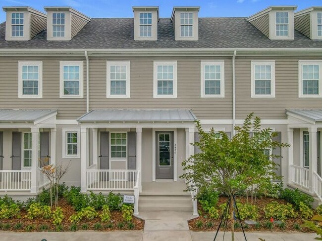 Building Photo - New Luxury Townhome in Celebration, FL Corner unit. All porcelain tiled floors. Aleutian model by...