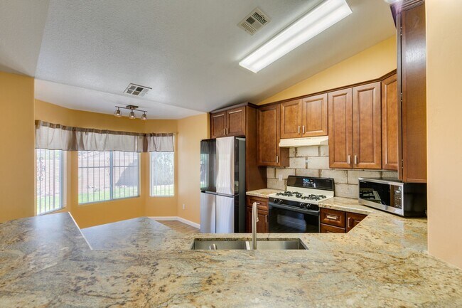 Building Photo - Updated Mediterranean-Style Home with Priv...