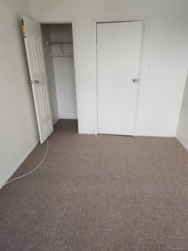 Building Photo - 205-11 Hollis Ave