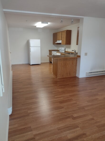 Kitchen Seen From LR - The Apartments at Lamberton
