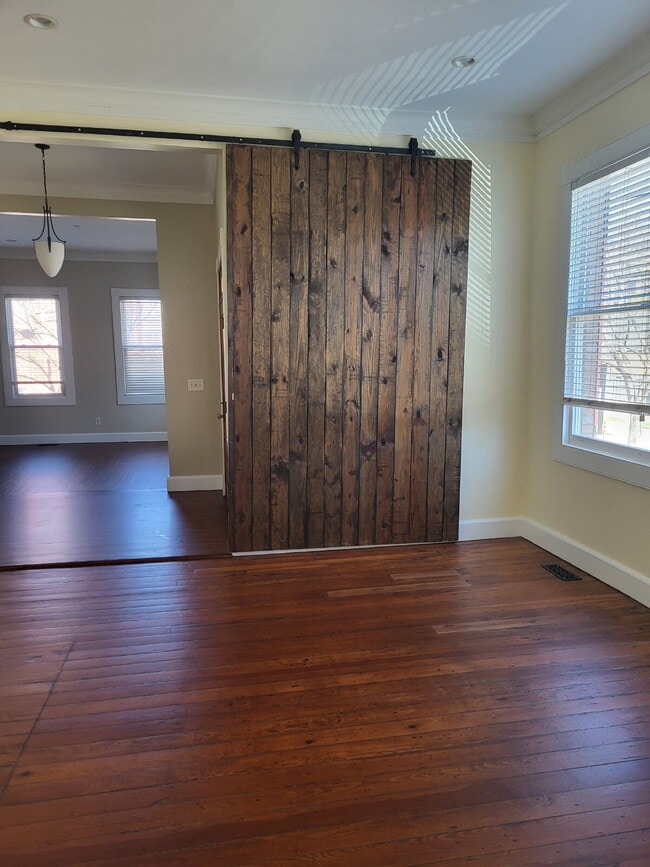 Building Photo - "Spacious 2-Bedroom Retreat with Hardwood ...