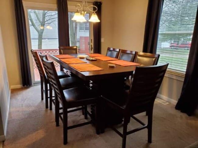 Building Photo - Furnished family home with large fenced backyard