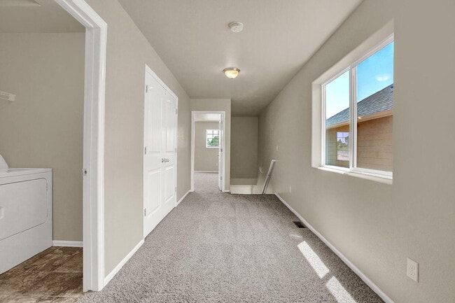Building Photo - Modern Townhome with Central A/C, 2-Car Ga...